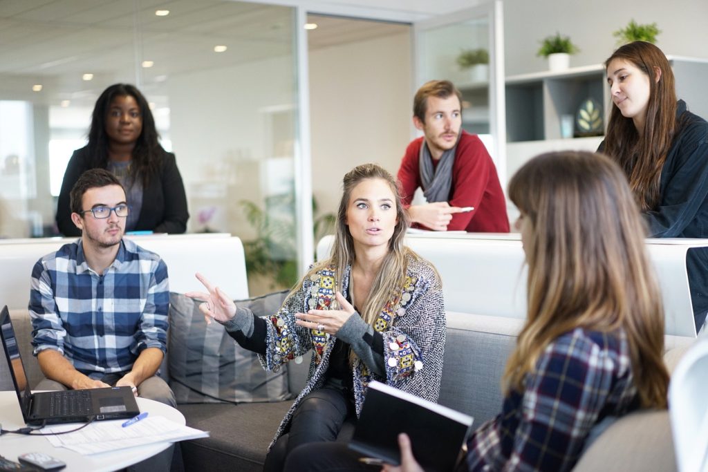 coworkers discussing changes at their company